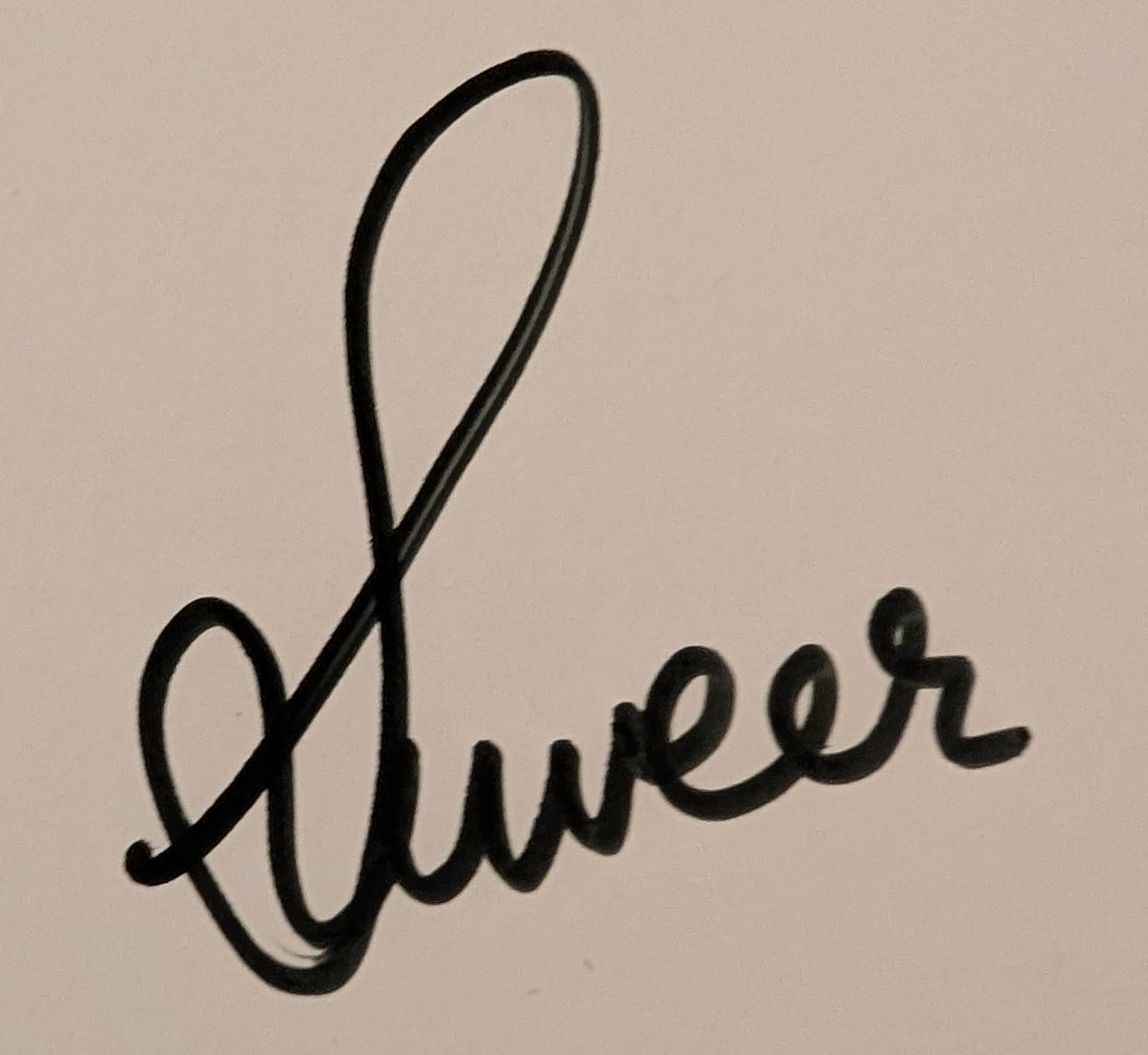 Author's signature — Suveer T N